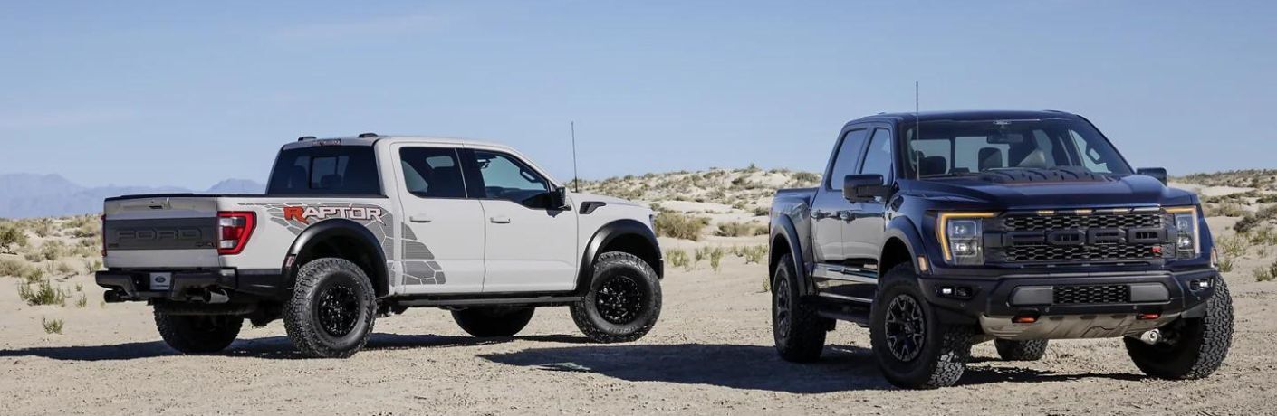 2023 Ford F-150 trucks parked together off-road