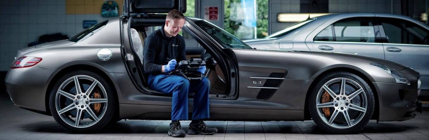 Mechanic checking the vehicle's component