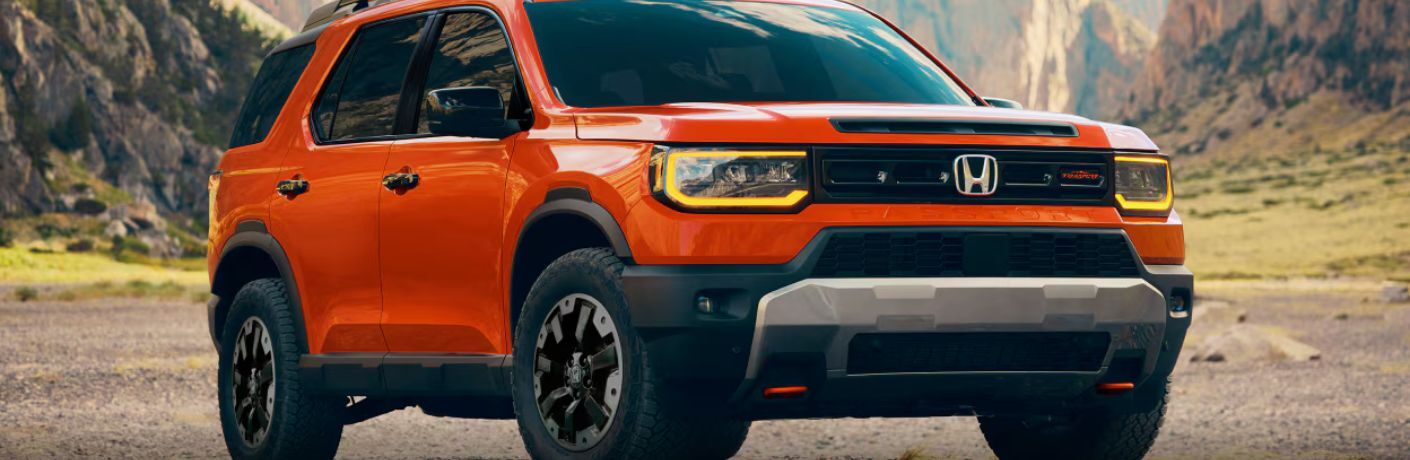 Front-quarter view of the 2026 Honda Passport Orange