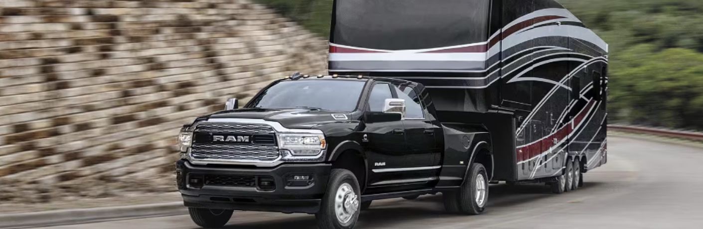 2023 Ram 3500 Laramie towing a trailer