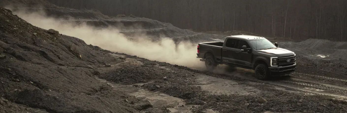 2027 Ford F-Series Super Duty driving in mud