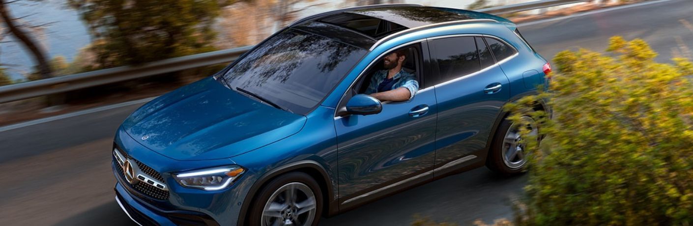 2023 Mercedes-Benz GLA 250 SUV Blue driving on the road