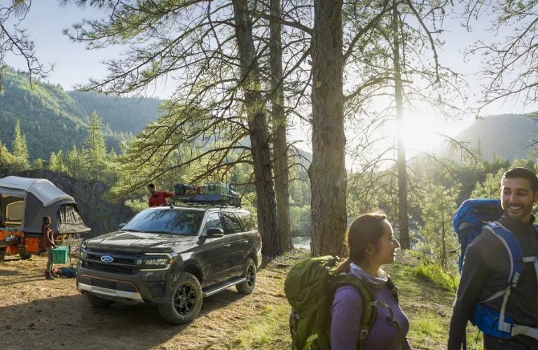 Friends enjoying a camping trip with the 2024 Ford Expedition MAX