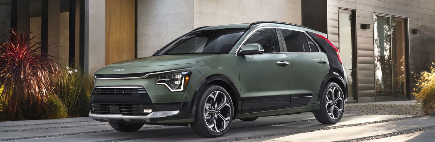 2024 Kia Niro Hybrid parked outside a house
