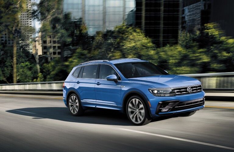Front passenger angle of a blue 2020 Volkswagen Tiguan