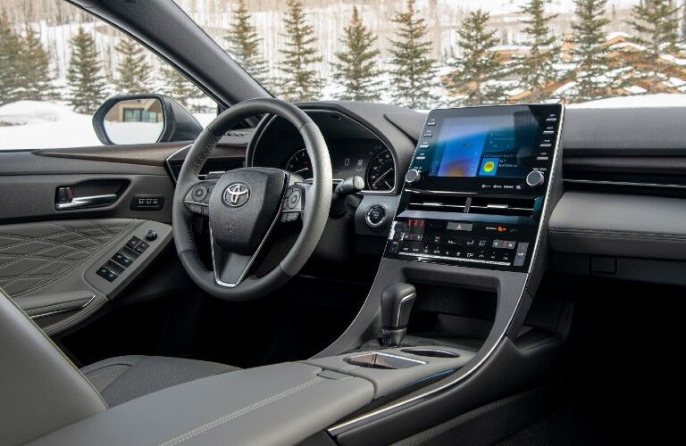 Steering wheel, gauges, and touchscreen in 2021 Toyota Avalon