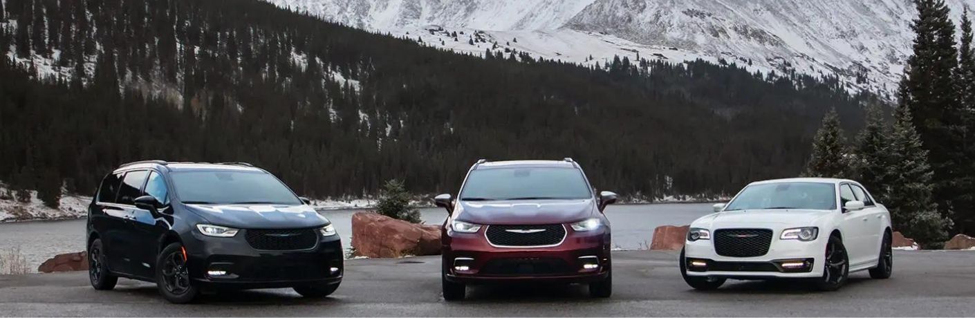 Chrysler Voyager minivans parked together