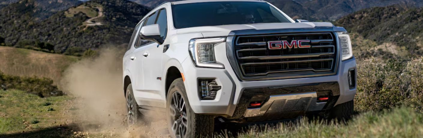 2024 GMC Yukon in an off-road rocky terrain