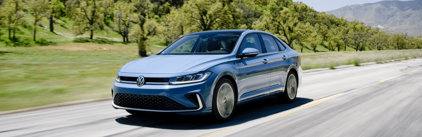 Side view of the 2025 Volkswagen Jetta on road