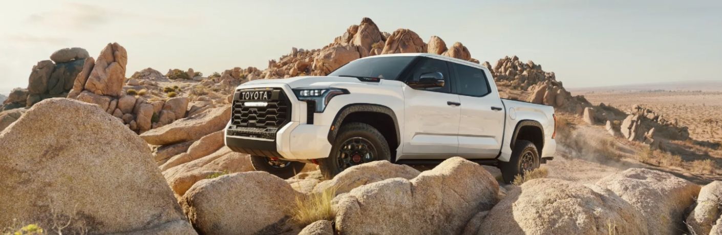 front quarter and side view of the 2022 Toyota Tundra on rocks