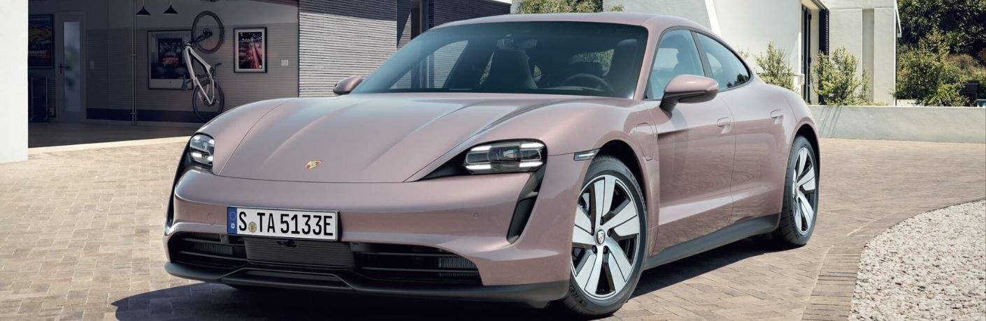 A 2023 Porsche Taycan on a tiled floor