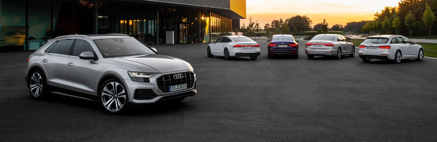 pre-owned Audi models parked together