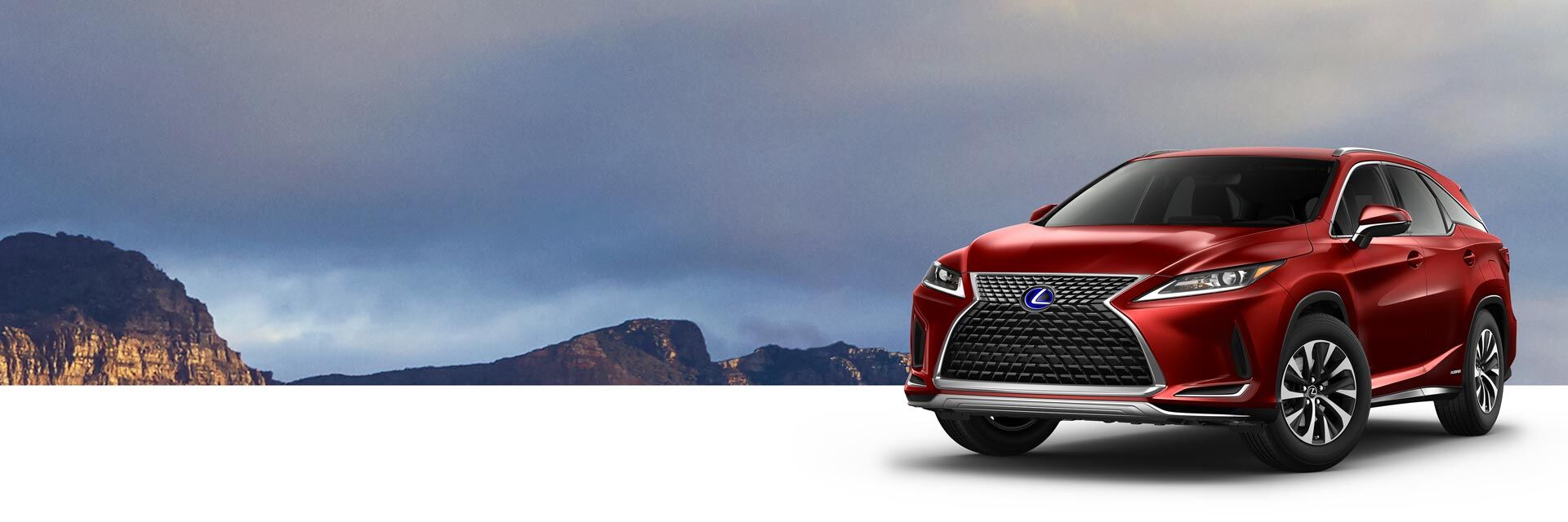 Exterior of the Lexus RXL Hybrid shown in Matador Red Mica.