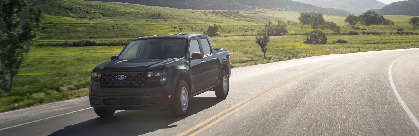 2025 Ford Maverick driving on a road