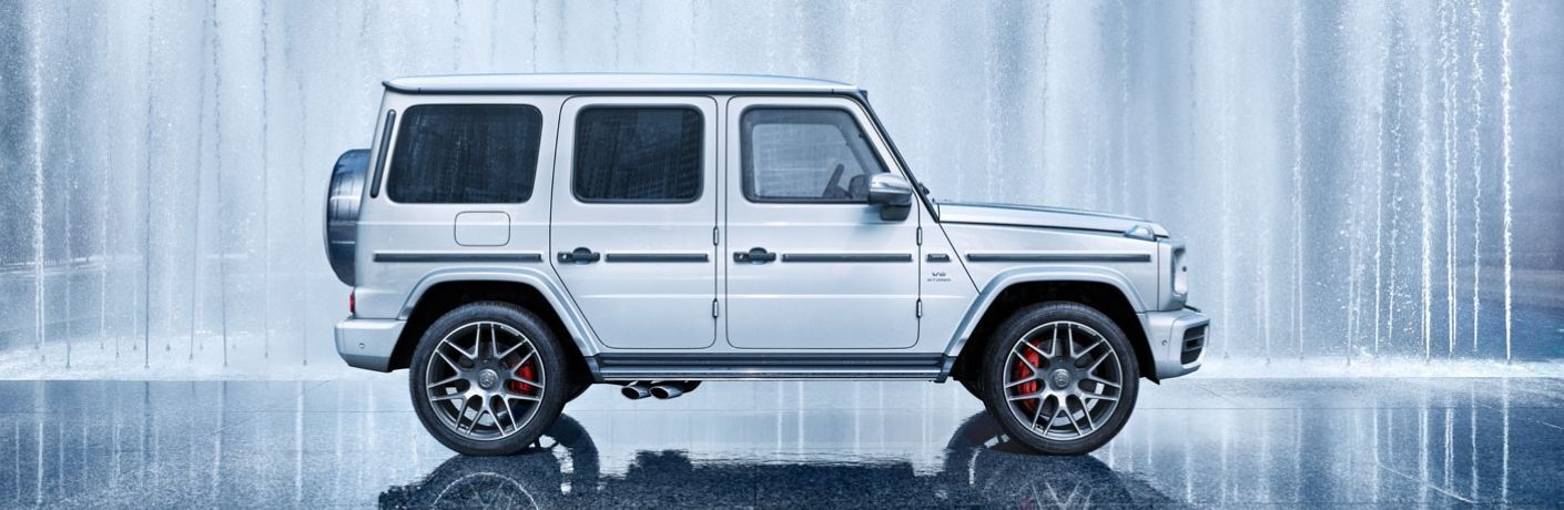 Side view of the 2023 Mercedes-Benz G-Class AMG G 63 SUV White parked