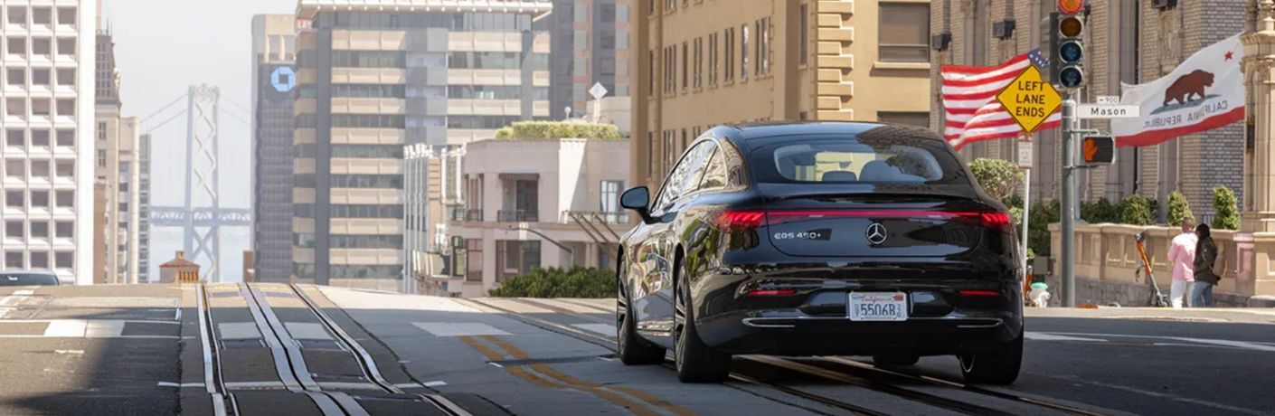 rear view of a Mercedes-Benz on the road