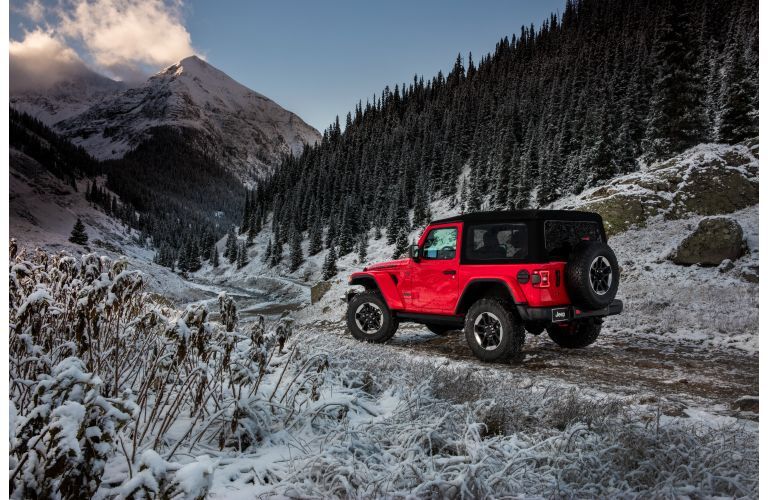 2021 Jeep Wrangler driving on the hill side