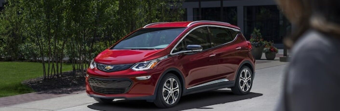 2021 chevy bolt red exterior front fascia driver side parked in driveway