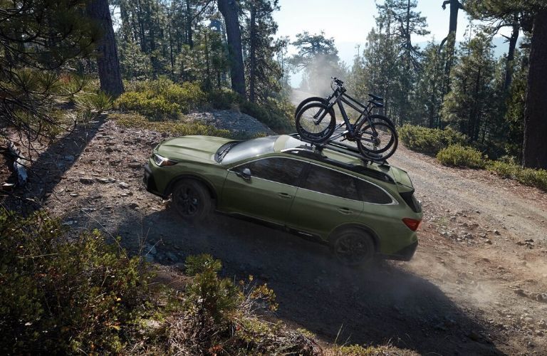 2020 Subaru Outback driving in forest