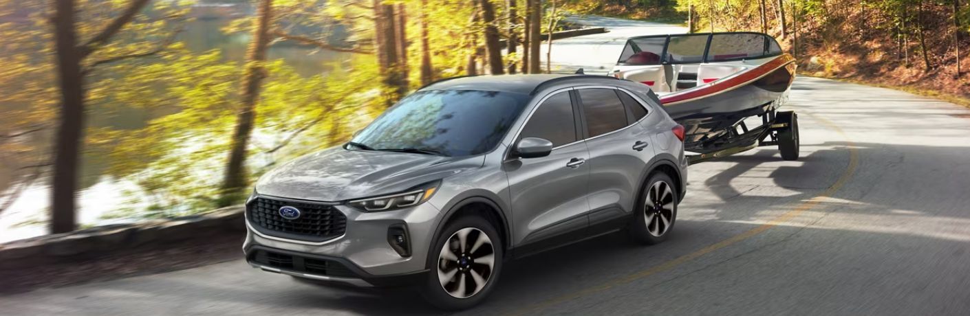 2024 Ford Escape towing a boat