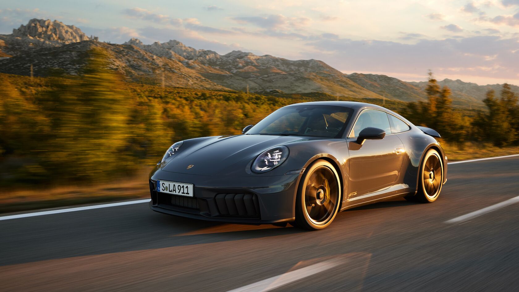 2026 Porsche 911 Carrera GTS T-Hybrid driving – Champion Porsche South Florida