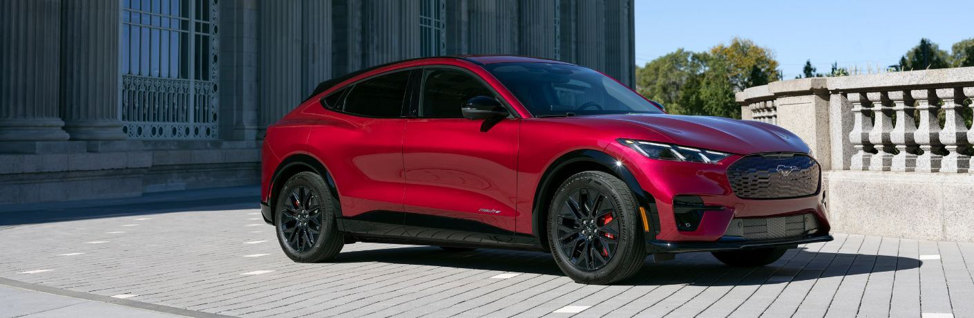 2025 Ford Mustang Mach-E side and front view in red