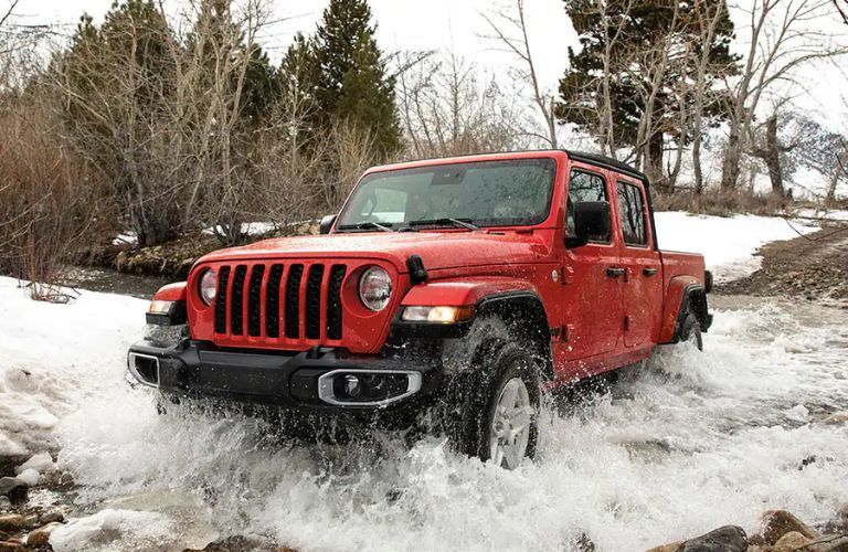 2023 Jeep Gladiator driving through water