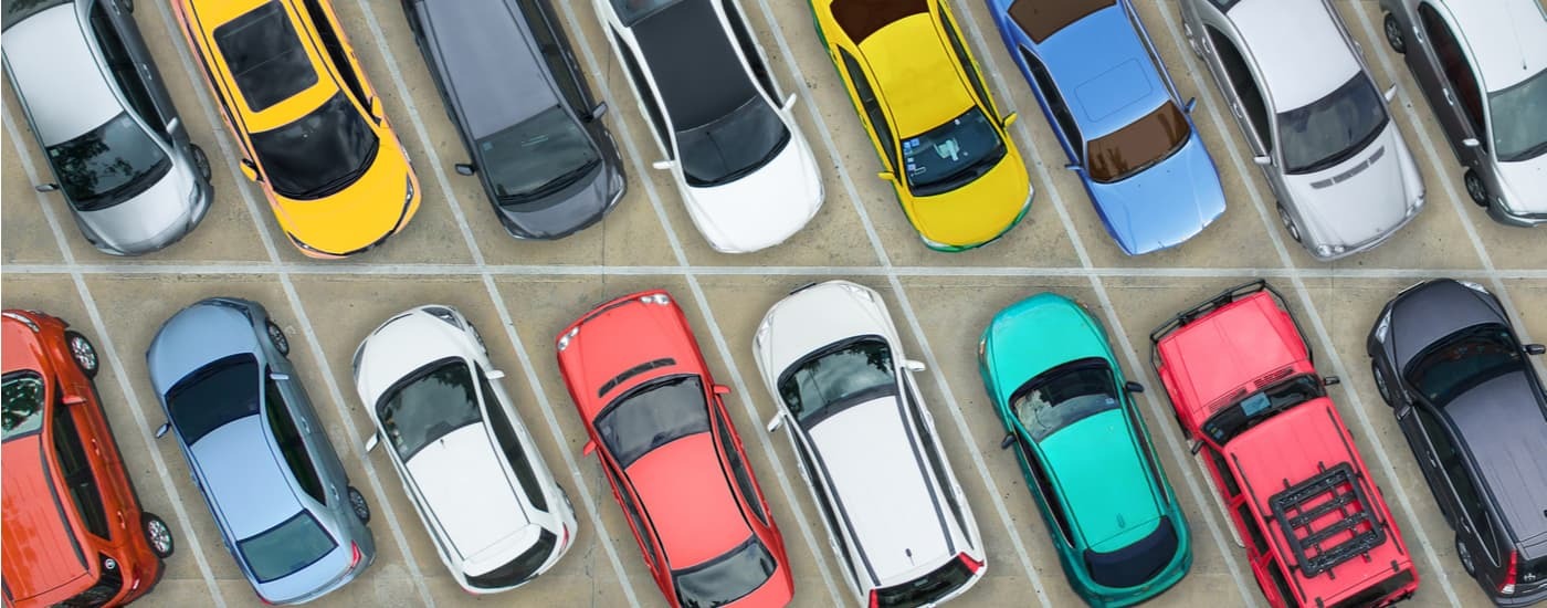 A top down view of rows of colorful used cars for sale near Elizabeth.