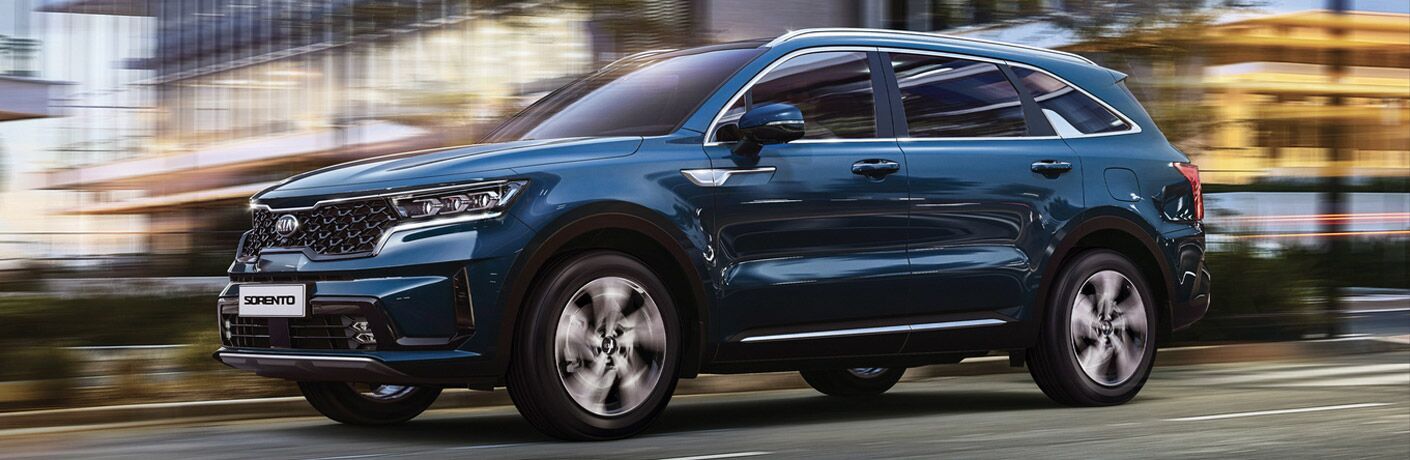 Blue 2021 Kia Sorento Driving on City Street