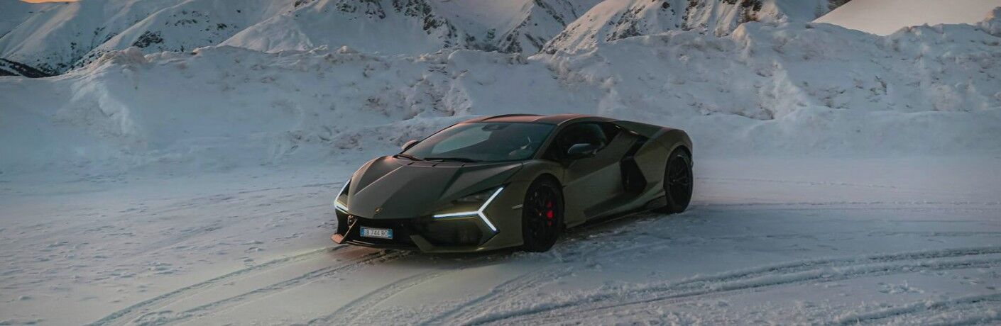2026 Lamborghini Revuelto driving in snow
