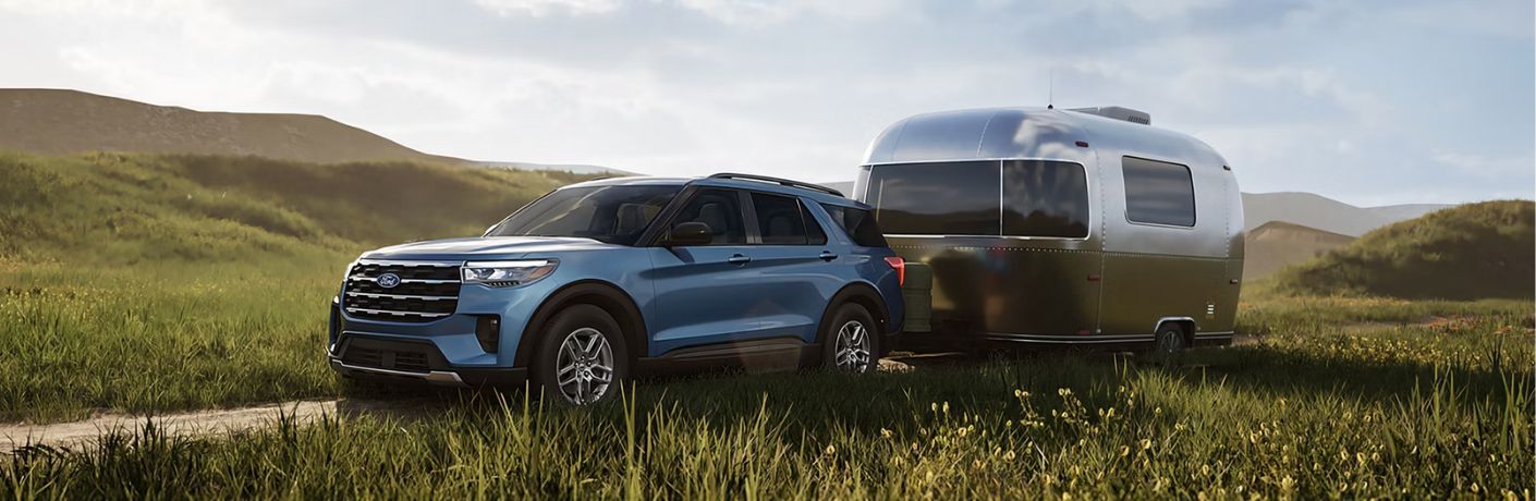 2027 Ford Explorer towing a trailer