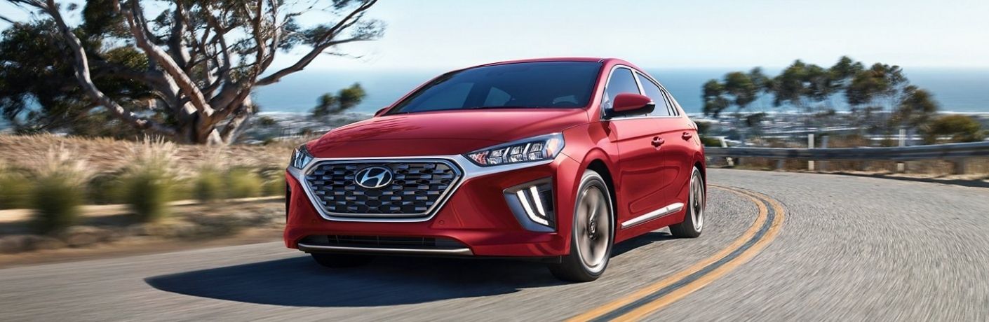 A 2022 Hyundai IONIQ Hybrid speeding on a road