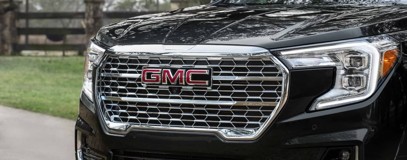 Grille on a used black 2023 GMC Terrain SUV for sale near Hoboken
