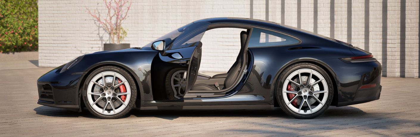 2026 Porsche 911 Carrera S exterior side view with open door