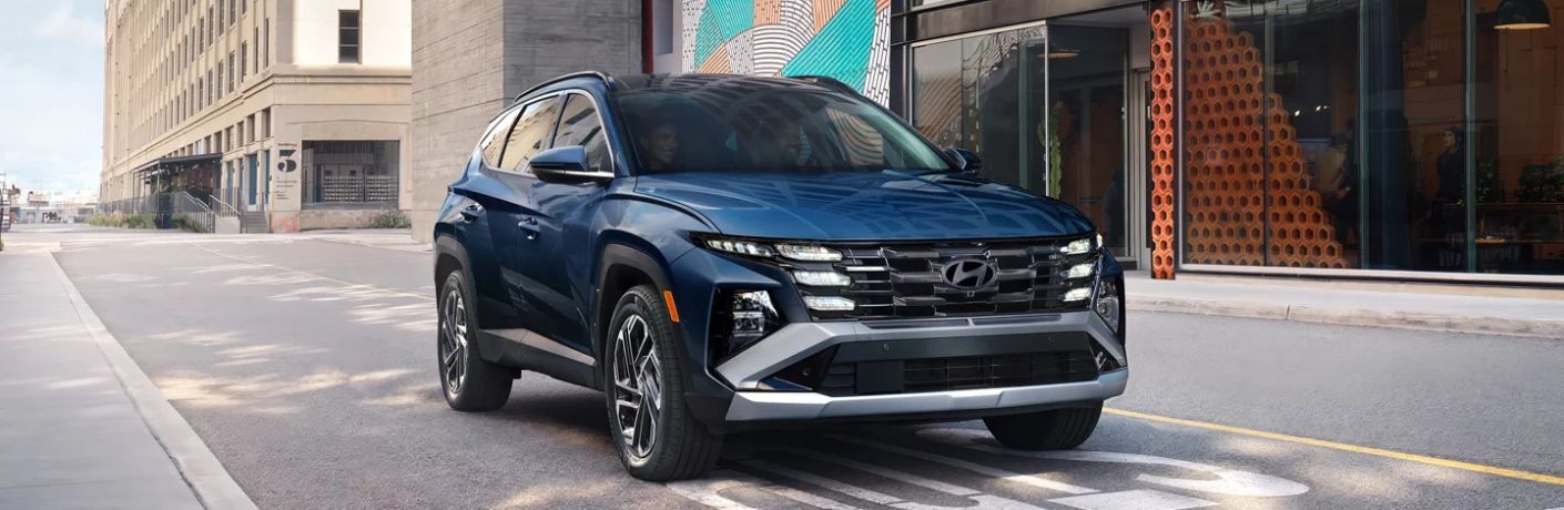 2026 Hyundai Tucson side and front view