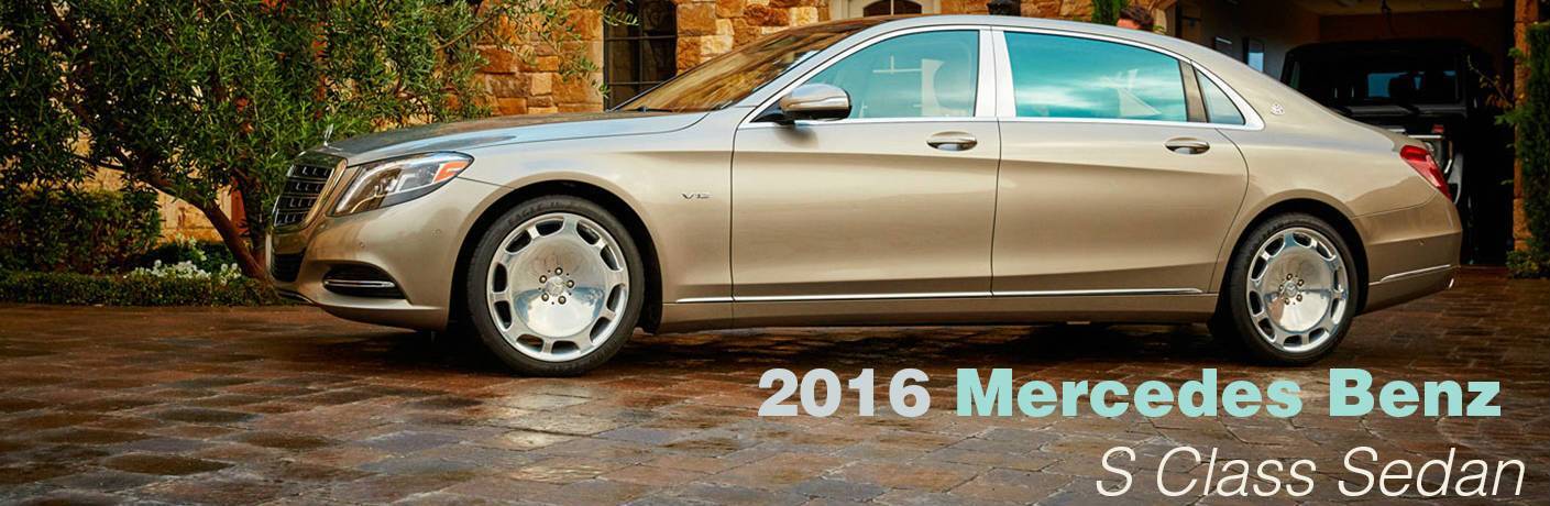 2016 Mercedes-Benz S-Class by a brick home