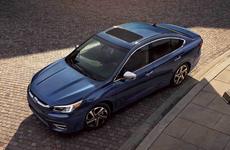 Front driver angle of a blue 2021 Subaru Legacy