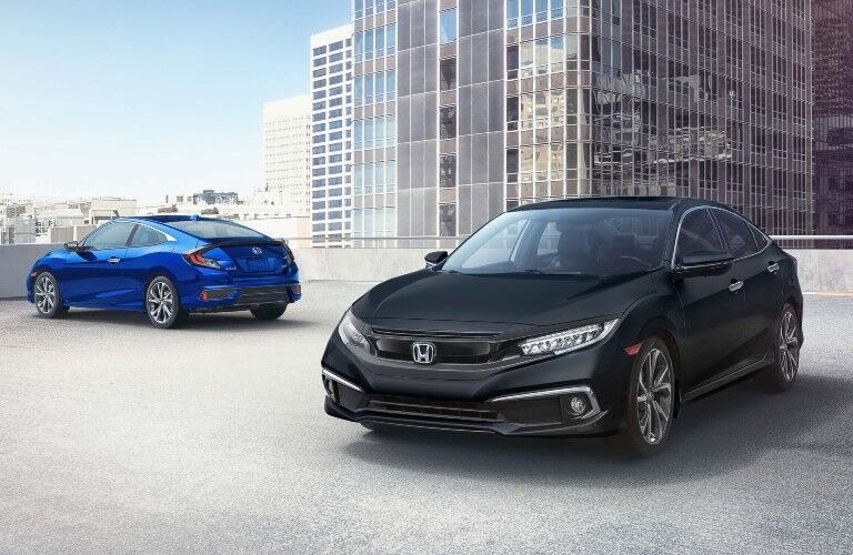 2020 Honda Civic Coupe vehicles in a city