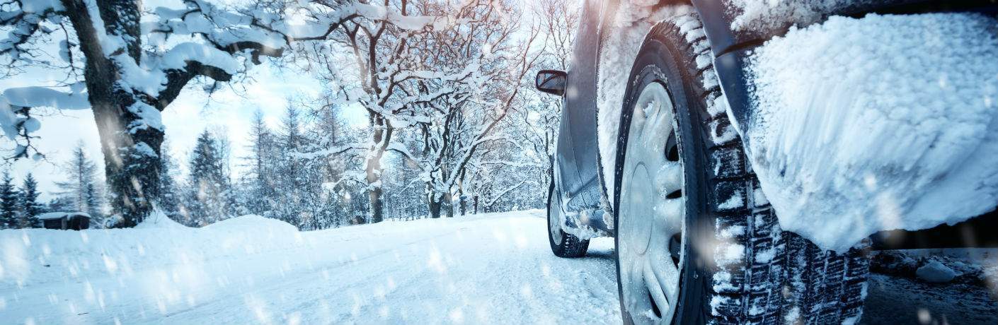 Car driving in snow