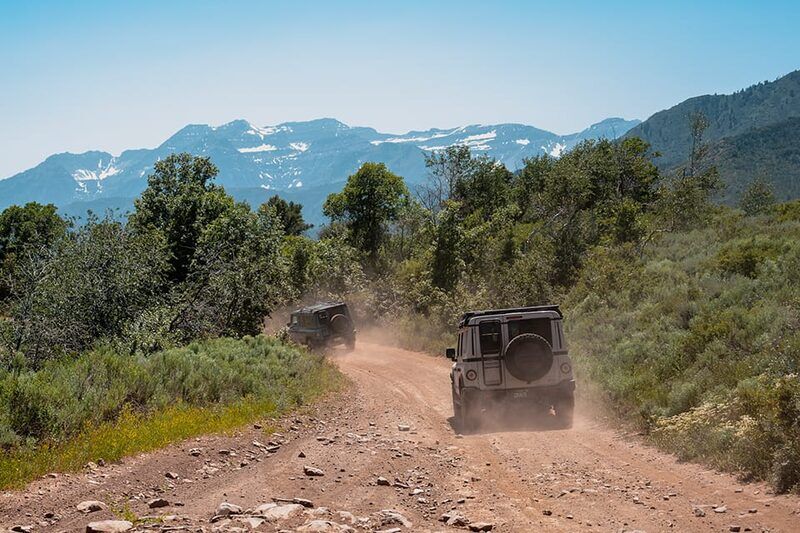 Grenadier convoy on a dusty mountain trail above Midway Utah