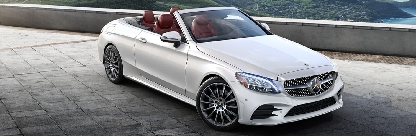 White 2022 Mercedes-Benz C-Class Cabriolet Front Exterior on a Coastal Overlook