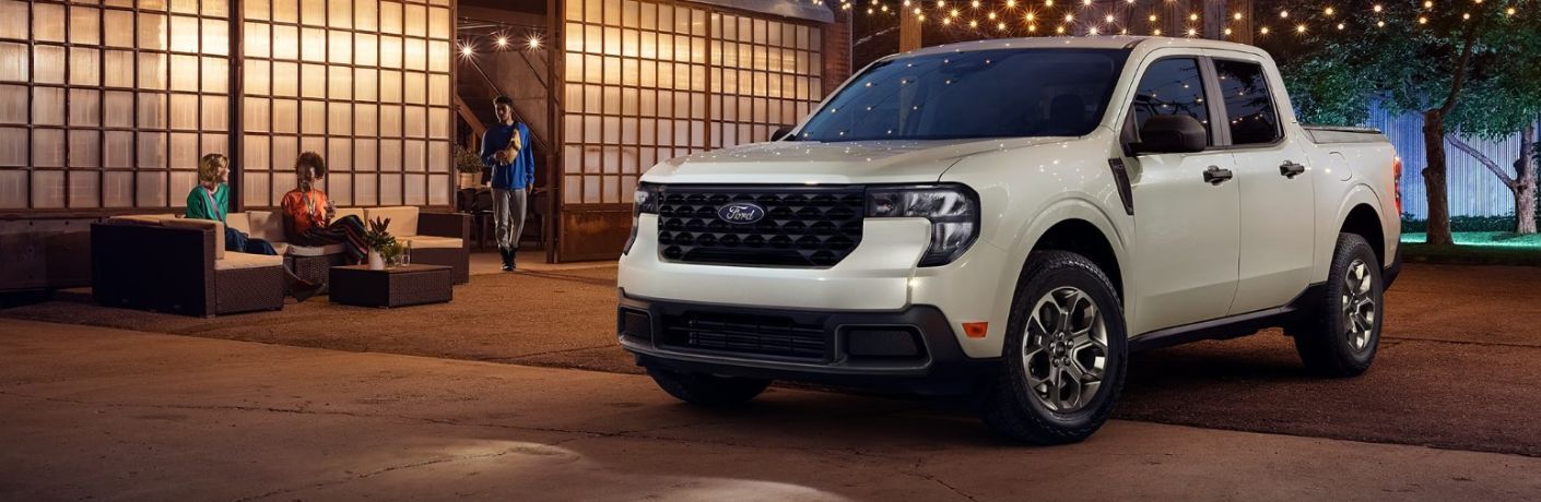 2025 Ford Maverick in white parked by people