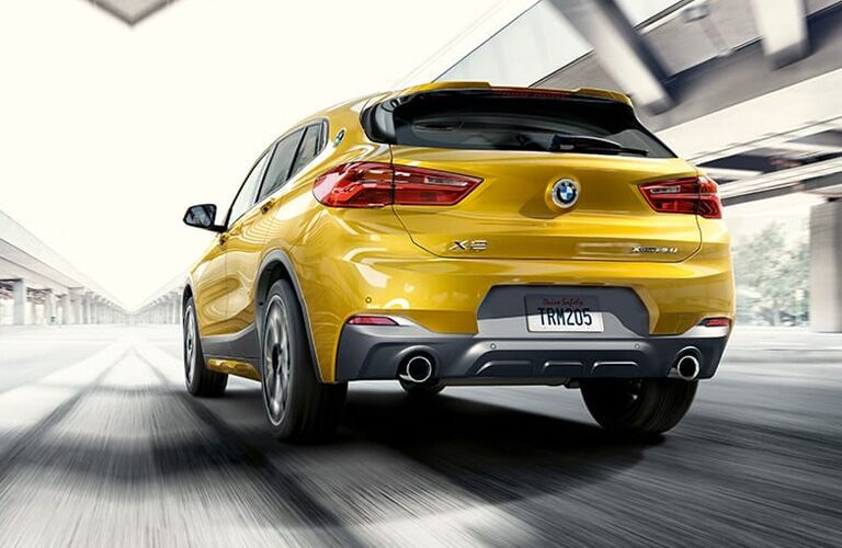 2022 Yellow BMW X2 from behind
