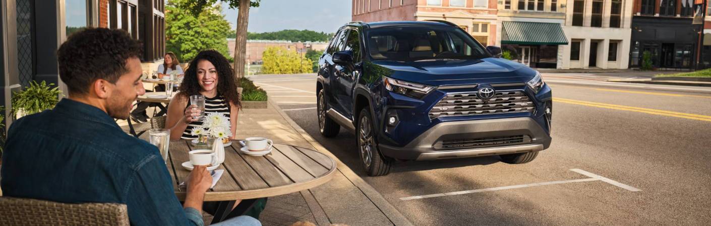 A 2025 Toyota RAV4 in a street scene