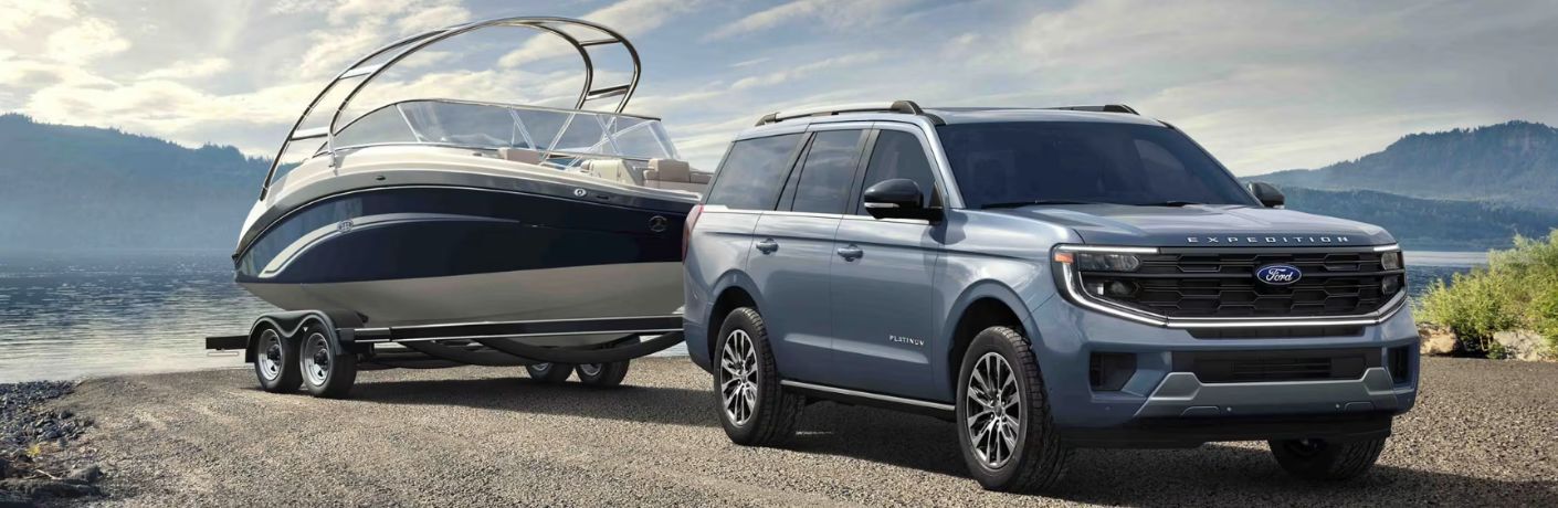 2025 Ford Expedition Max towing a boat