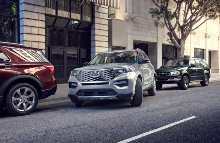 Silver 2020 Ford Explorer Platinum pulling out of parking space