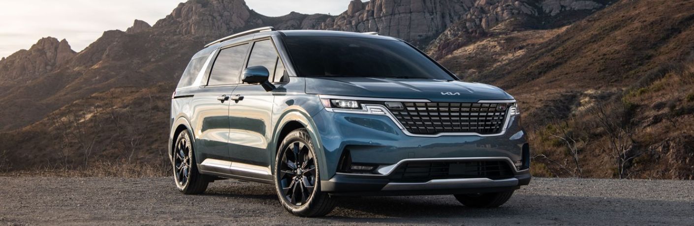 2024 Kia Carnival side and front view