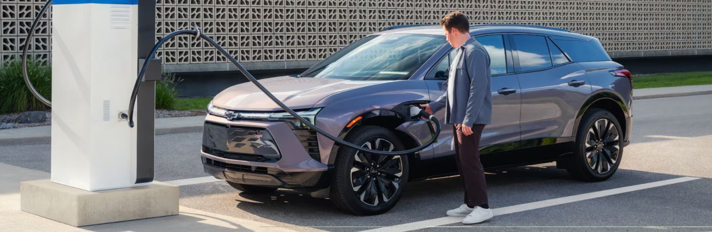 a 2024 Chevrolet Blazer EV charging at a charging point