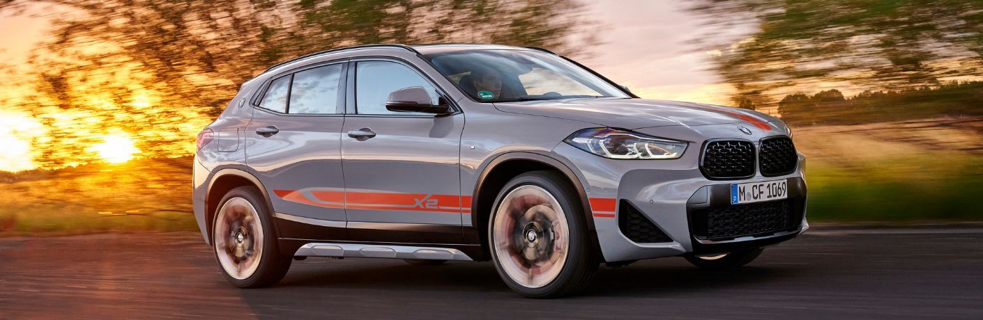 Used BMW X2 Gray driving on the road