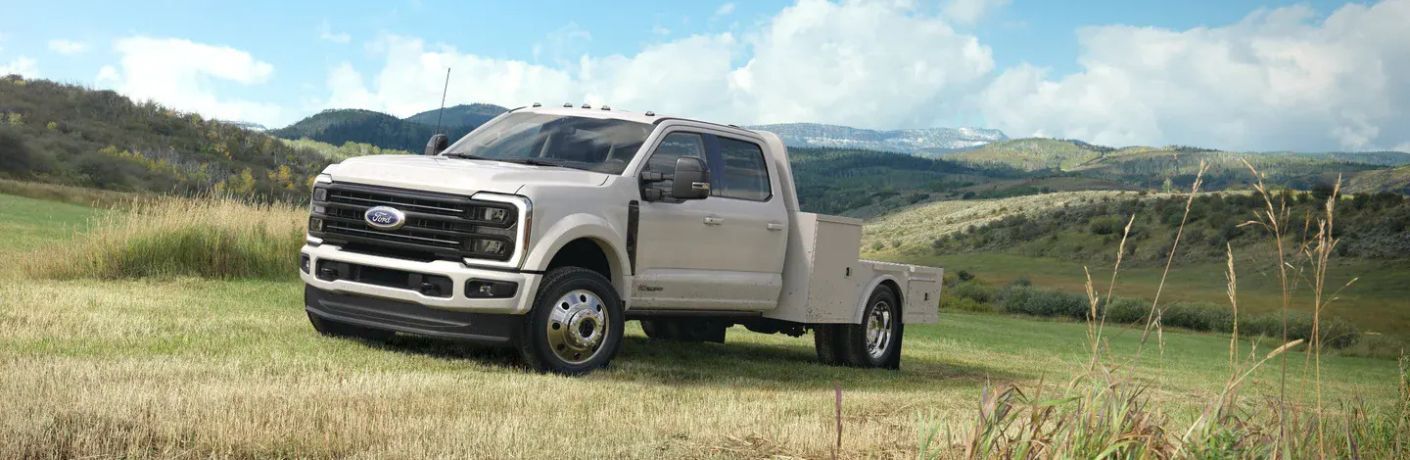 2027 Ford Super Duty truck in a grassy field